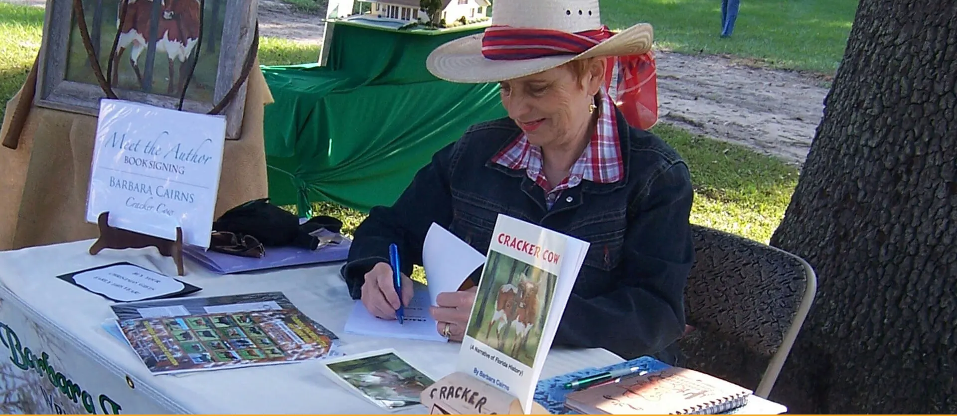 Barbara Signing the Books at Exhibition